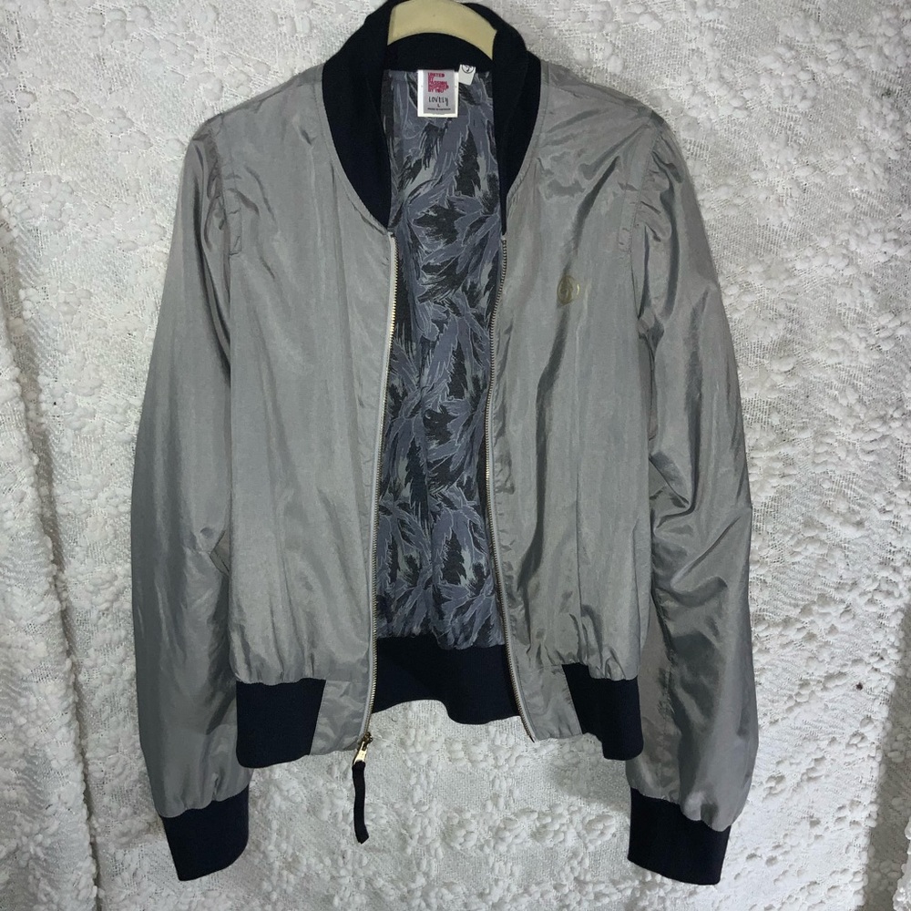 Zumba athletics workout jacket with gold symbol